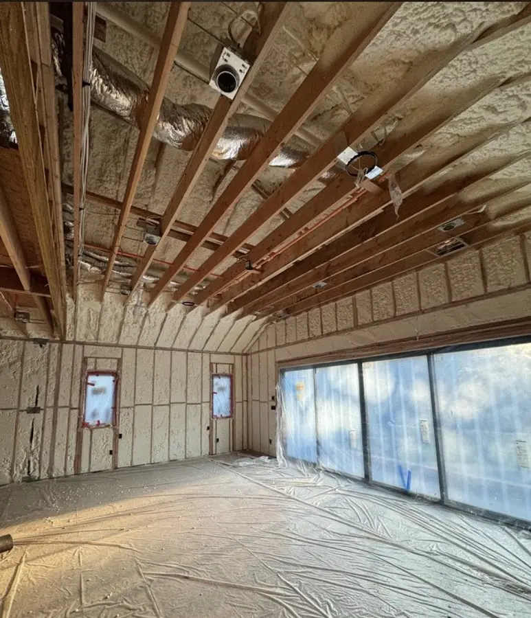 Interior walls and ceiling insulated with spray foam during new construction in Alondra Park